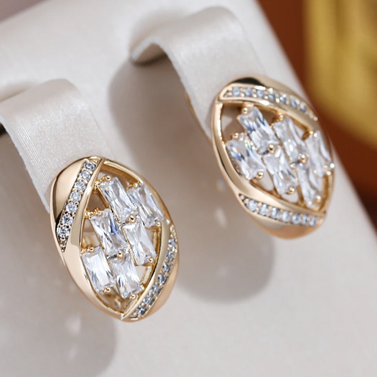 Stylish gold earrings with elegant round white crystals