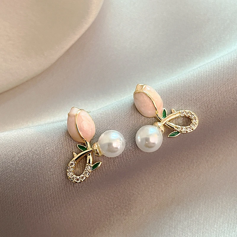 Tulip-inspired earrings with elegant pearl accents