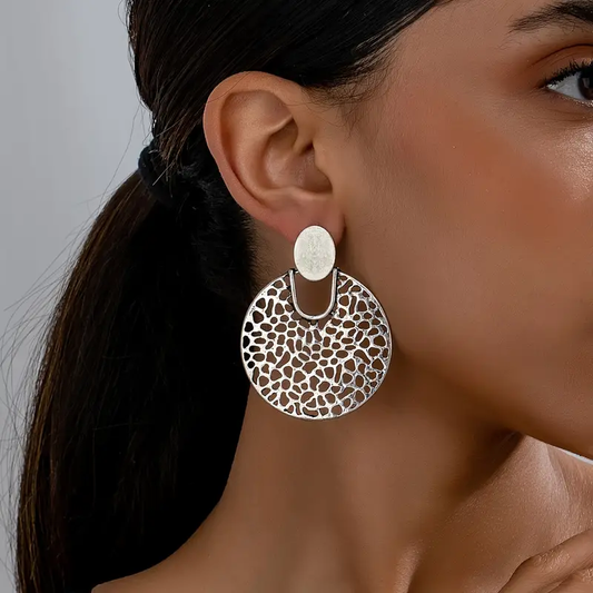 Elegant round mandala earrings with timeless silver finish