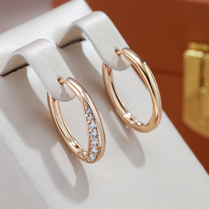 Elegant gold earrings with sparkling zirconia stones