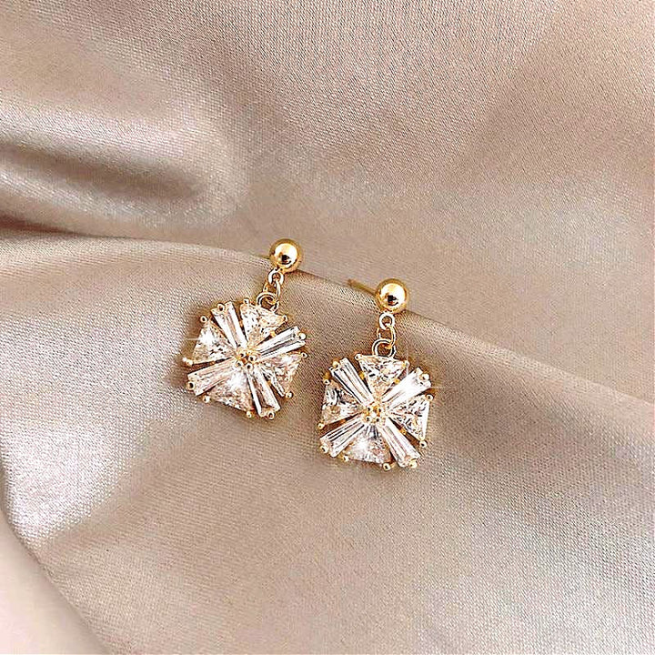 Elegant gold earrings with sparkling cubic zirconia stones