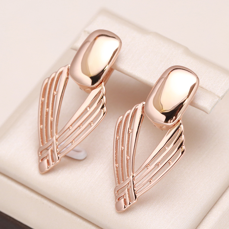 Exquisite Gold Earrings with Shield Design