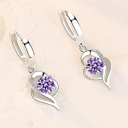 Shiny silver earrings with sparkling zirconia stones